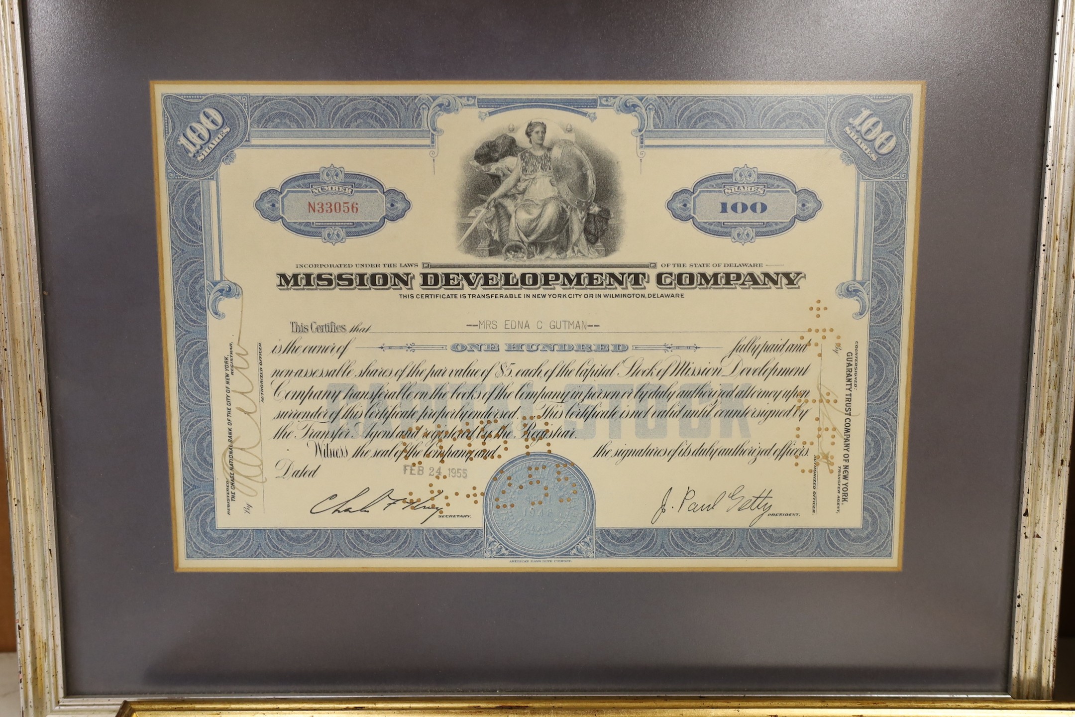 Four framed Share Certificates: one Siberian, two USA and one Spainish.